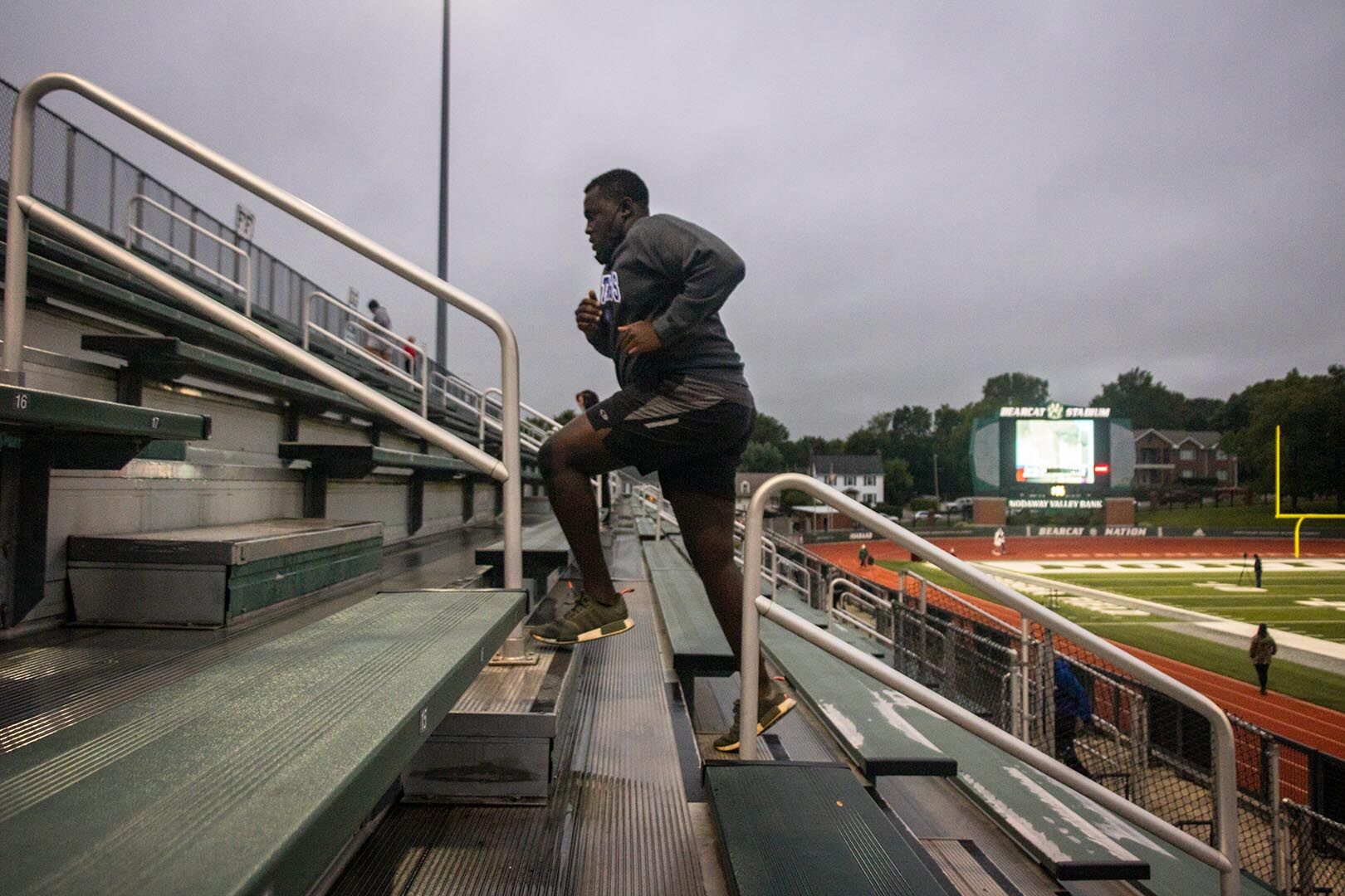 Kirayle Jones running up stairs